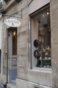 a store front with many items in the window