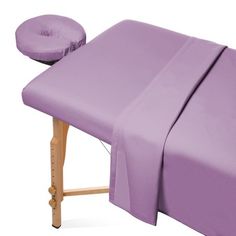 Sized to fit almost all massage tables with rounded or square corners. The elastic bound fitted sheet slips on easily, stays in place and easily accommodates use with a bolster. The oversized fitted sheet provides maximum table coverage and a clean style. Elasticized headrest cover fits most standard massage table crescent shaped face cradle pillows. Color: Purple.  Pattern: solid. Small Beauty Salon Ideas, Small Beauty Salon, Reiki Massage, Facial Bed, Headrest Cover, Remedial Massage, Salt Therapy, Salt Stone, Massage Tables