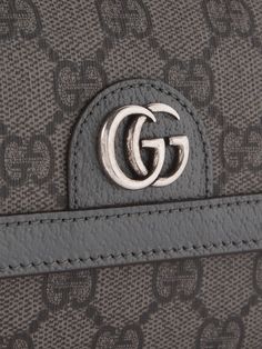 Gucci's leather-trimmed 'Ophidia' messenger bag has been made in Italy from signature 'GG Supreme' coated-canvas, printed with an interlocking logo based on a 1930s design. It's perfectly sized to hold the essentials and fitted with internal card slots, so you can leave the wallet at home. Pop your keys in the front snap pocket for easy access. Gucci Shoulder Bag In Signature Coated Canvas For Everyday, Luxury Formal Shoulder Bag In Signature Coated Canvas, Luxury Formal Shoulder Bag In Coated Canvas, Gucci Shoulder Bag In Signature Coated Canvas, Designer Bags With Coated Canvas And Leather Lining, Gucci Designer Shoulder Bag For Business, Designer Coated Canvas Bags With Leather Lining, Gucci Luxury Shoulder Bag In Signature Coated Canvas, Luxury Gucci Signature Coated Canvas Shoulder Bag