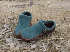 a pair of shoes that are sitting in the grass