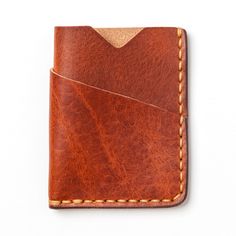 It's a great little leather wallet.Our English Tan Front Pocket Wallet is more than meets the eye. It snugly holds all your cash and cards and disappears in your jeans. Its premium leather makes it a pleasure to hold every time you reach for it.Full-grain leather means this wallet will develop character and patina. We hand-sew this wallet with thick Tiger Thread for decades of use. We also burnish and polish the wallet edges, which adds refinement to the finished piece. Our minimalist design all Leather Card Holder With Flat Pocket For Everyday Use, Brown Bifold Card Holder With Pockets, Leather Trifold Wallet With Pockets, Brown Card Holder With Pockets For Everyday, Leather Bifold Card Holder With Pockets, Brown Leather Wallet With Flat Pocket, Brown Trifold Wallet With Leather Patch For Everyday, Brown Trifold Wallet With Leather Patch, Leather Card Holder With Pockets For Everyday Use