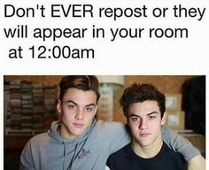 two young men sitting next to each other in front of a sign that says, don't ever repost or they will appear in your room at 12 00am