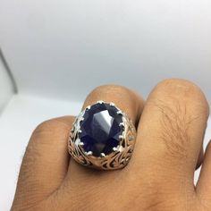 Video: https://youtu.be/TaPO9PVmDI4 Mens Dark blue rich color sapphire ring for men and women. Stone is in great color clean shine prime luster and big in size and weight. Stone is from Kashmir, known as world greatest place for Sapphires Ring is made by our team members which is more unique and beautiful by its design. Ring is made by Premium sterling silver 925. Ring size 9 US but resize able as per buyer choice We accept and prefer PayPal for our customers, rest is our buyer's choice. We ship Oval Sapphire Emerald Ring In Silver, Polished Finish Sapphire Ring, Stamped 925 Sapphire Ring, Silver Sapphire Emerald Ring With Gemstone, White Gold Sapphire Ring Stamped 925, Sapphire Ring For Men, Neelam Ring, Mens Sapphire Ring, Kashmir Sapphire