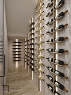 a wine cellar filled with lots of bottles next to a wall mounted wine bottle rack