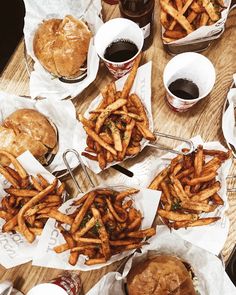 french fries and burgers are on the table