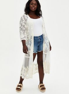 Embroidered mesh fabric. Scalloped edges; mesh lace. Open front. Long sleeves. CONTENT + CARE 100% polyester. Wash cold; line dry. Imported plus size kimono. SIZE + FIT Model is 5'9”, size 1. Size 2 measures 46” from shoulder. The best plus size women's ivory embroidered mesh duster kimono cardigans & dusters in optic white made of mesh. White Lace Kimono, Mesh Kimono, Duster Kimono, Crochet Kimono, Plus Size Kimono, Maxi Kimono