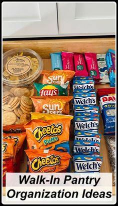 an organized pantry with cookies, crackers and other snacks on the bottom shelf is labeled walk - in pantry organization ideas