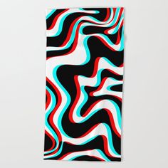 a black and white towel with red, blue, and green swirls on it