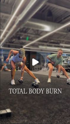 two people doing squats in a gym with the words total body burn on it