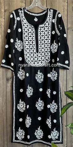 Soft, flowy Chikankari Kurta on modal cotton Hand embroidered.  Kurta length: 45 inches Summer Long Sleeve Kurta With Motifs, Spring Cotton Kurta With Motifs, Cotton Kurta With Intricate Embroidery For Festivals, Black Traditional Summer Kurta, Traditional Black Summer Kurta, Cotton Traditional Wear With Intricate Embroidery For Spring, Spring Cotton Traditional Wear With Intricate Embroidery, Embroidered Traditional Wear For Summer, Summer Cotton Dupatta With Intricate Embroidery