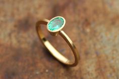 18k ring with emerald by badenmueller on Etsy Minimalist Emerald Ring For Formal Occasions, Minimalist Green Oval Emerald Ring, Minimalist Oval Green Emerald Ring, Backyard Wedding Ceremony, Ring With Emerald, Single Stone Ring, Future Engagement Rings, Solitaire Rings, Single Stone