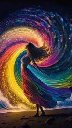 a woman is standing on the beach in front of a rainbow swirl painting with stars