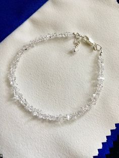 "These well made, dainty Herkimer diamond bracelets are just perfect!  Just right amount of sparkle for your wrist.  These crystals are clear, clean and very lively.  All strung on quality jewelry wire for strength and longevity. The size is adjustable from 7\" to 7-1/2\", if you need a different size please contact me." Goldstone Bracelet, Herkimer Diamond Earrings, Bracelet Dainty, Dainty Bracelet, Jewelry Wire, Pretty Bracelets, Dainty Bracelets, Strand Bracelet, Herkimer Diamond