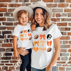 Show your team spirit in style with our Tennessee Football Mommy and Me Game Day Shirts! Match with your little one and cheer on the Tennessee Vols together. Perfect for game day, these shirts are a must-have for any football-loving family. Get your hands on these adorable matching shirts and make unforgettable memories on game day! *ABOUT THE ADULT SHIRT *Short Sleeve  *Flattering, unisex fit.  *Crewneck styling *Several brands available-  Bella Canvas *Available in many colors *ABOUT THE TODDL Tn Vols Football, Tennessee Shirt, White Washing, Matching Family T Shirts, Tennessee Vols, Tennessee Football, Football Football, Girls Graphic Tee, Loving Family