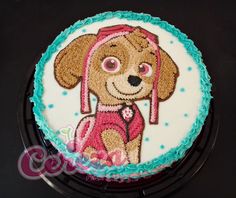 a birthday cake with a dog on it