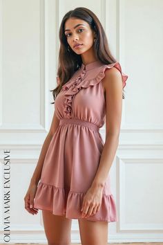 Olivia Mark - Ruffled Elegance Smocked Waist Mini Dress in Blush Pink Pink Summer Ruffle Dress With Smocked Back, Pink Ruffle Dress With Smocked Back For Summer, Feminine Ruched Ruffle Dress For Spring, Feminine Mini Dress With Smocked Bodice, Chic Ruffle Dress With Smocked Bodice, Feminine Mini Dress With Smocked Back And Ruffle Sleeves, Casual Ruffle Dress With Smocked Bodice, Chic Pink Smocked Dress, Chic Ruffle Dress With Smocked Bodice For Brunch