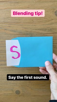 someone is holding up a piece of paper with the letter s on it that says, blending tip say the first sound