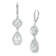 Beautifully crafted, these exquisite drop earrings make that special evening out a memorable occasion. Fashioned in sterling silver, these styles pair cushion-cut and pear-shaped lab-created white sapphires, each bordered with frames of smaller white sapphire accents, together in an elegant drop. The earring fronts also glisten with white sapphire accents. Polished to a brilliant shine, these dramatic drops suspend from and secure with lever backs. Teardrop Diamond Cut Bridal Earrings For Evening, Formal Teardrop Chandelier Earrings With Diamond Accents, Teardrop Chandelier Earrings With Diamond Accents For Formal Occasions, White Diamond Cut Teardrop Earrings, White Diamond-cut Teardrop Earrings, Bridal Dangle Earrings With Diamond Cut, Elegant Teardrop Diamond Cut Chandelier Earrings, White Pear-shaped Teardrop Earrings With Diamond Accents, White Diamond Accented Pear-shaped Teardrop Earrings