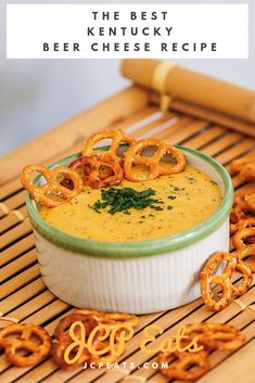 the best ketchup beer cheese recipe in a bowl with pretzels on top