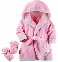 a pink bathrobe with matching slippers and booties