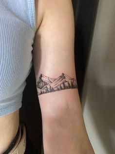 The 90 Most Popular Symbols For Travel Tattoos | Unique & Cute Travel Tattoo Ideas Small Mountain Forearm Tattoo, Mountain Band Tattoo For Women, Moutain Tattoos Half Sleeve, Minimalist Elbow Tattoos For Women, Mountains Around Arm Tattoo, Simple Relationship Tattoos, Adk Mountain Tattoo, Mountain Tattoo Around Arm, Arm Tattoos For Women Mountains