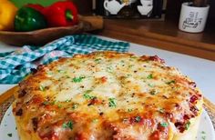 a cheesy casserole on a white plate