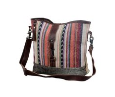 Go for a classy yet dramatic look with the multicolored shoulder bag. This handy bag comes with an adjustable shoulder strap to meet your convenience. Item Width 15.5 Item Depth 5 Item Height 12 Color n/a Handle n/a Multicolor Shoulder Bag With Adjustable Handle For On-the-go, Multicolor Crossbody Shoulder Bag For On-the-go, Everyday Tote Flap Bag With Single Shoulder Strap, Everyday Use Tote Flap Bag With Single Shoulder Strap, Chic Canvas Shoulder Bag With Adjustable Handle, Travel Shoulder Bag With Single Strap, Chic Canvas Crossbody Shoulder Bag, Beach Shoulder Bag With Leather Handles, Trendy Multicolor Bag With Adjustable Handle