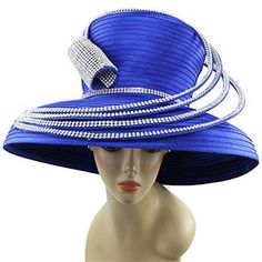 Introducing our Sunday Hat 9116-RYL â a truly sophisticated accessory that promises to add a touch of elegance to your weekend wardrobe. This statement piece is fashioned in a vibrant royal blue, reflecting a sense of luxury and high fashion. The Sunday Hat 9116-RYL is not just about style; itâs also crafted with your comfort and protection in mind, featuring a wide brim that shields you from the sun's rays during outdoor events or garden parties. The hat is adorned with a sparkling crystal Church Hats African Americans, Church Suits, Elegant Hats, Large Image, Church Hats, Weekend Wardrobe, Style And Grace, Outdoor Events, Sparkling Crystal