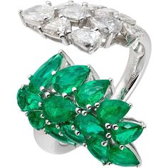 Indulge in the tropical allure of our Palm Ring from Ruchi New York. The dazzling ring features a unique open shank design, elevated by the exquisite pairing of vibrant emeralds and diamond pears. Perfectly crafted, this piece boasts 2.18 carats of emeralds and 1.22 carats of diamonds, making it the perfect luxurious adornment for any fine jewelry enthusiast. Add a touch of glamour to your look with this stunning cocktail ring, handcrafted from premium 18k white gold. Trust us, this piece is sur Luxury Green Marquise Diamond Ring, Green Cluster Luxury Ring, Luxury Green Diamond Open Ring, Palm Ring, Tropical Paradise, Cocktail Ring, Cocktail Rings, Diamond Rings, Paradise