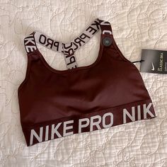 Nike Pro Classic Sports Bra. Sz. Xs Color: Brown/Maroon Never Worn. Nike Sports Bra For Training, Athletic Fit, Nike Athletic Fit Sports Bra For Training, Nike Squat Proof Gym Activewear, Red Nike Activewear For Gym, Nike Yoga Activewear, Nike Squat Proof Sportswear Activewear, Red Nike Running Activewear, Red Nike Activewear For Sports Season, Red Nike Activewear For Running