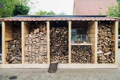 the firewood is stacked up and ready to be put into the house for sale