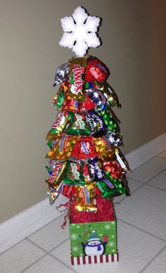 a christmas tree made out of candy bars