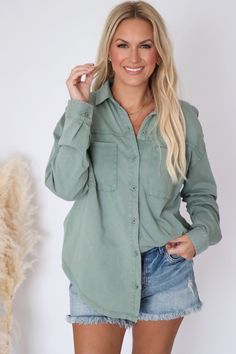 Relaxed but not oversized, this top is perfect as a throw-on top layer or chic button-up. The Niccola Button Up Top is that versatile layer you'll wanna have on-hand for all weather. 95% Cotton/ 5% Spandex Size Chart Size Small Measurements: Length: 22" Model is wearing size Medium Palm Green, Graphic Print Top, Loungewear Sets, Button Up Top, Sleeveless Sweater, Skirt Leggings, Blazer Coat, Long Sweaters, Hat Hairstyles