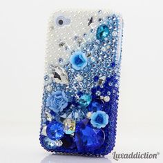 a cell phone case with blue flowers and pearls