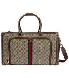 a brown and white bag with red, green and blue stripes on the bottom half