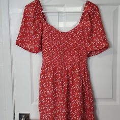 Size S Smocked Top Redish With Flowers Puff Sleeve Nwt Has Liner & Pockets Red Flowy Dress With Smocked Bodice, Red Smocked Dresses, Red Fitted Smocked Dress, Red Puff Sleeve Dress For Day Out, Fitted Red Smocked Dress, Fitted Red Smock Dress, Red Fitted Dress With Smocked Bodice, Red Smock Dress For Spring, Red Smocked Bodice Mini Dress For Summer