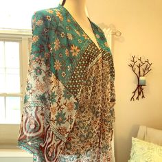 This 100%Poly Kimono Is All The Rage Right Now ..Can Be Used With Jeans ..As A Coverup..And Beachwear....This Is Brand New..Smoke Free Home...Bust Is48 And Length Is 50...One Size Fits Most.... Brown Boho Print Top For Beach, Beach Brown Top With Boho Print, One Size Brown Tops For Beach, Multicolor Beachwear Cover-up With Kimono Sleeves, Bohemian Multicolor Kimono For Beach Cover-up, Bohemian Multicolor Kimono As Beach Cover-up, Multicolor Kimono Beach Cover-up, Multicolor Printed Kimono For Beach Cover-up, Blue Brown