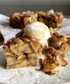 a piece of apple pie with ice cream on top