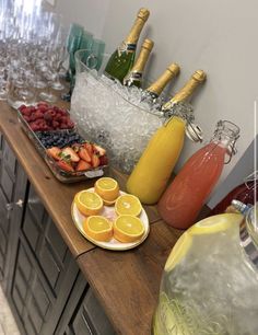 there are many different types of drinks on the counter