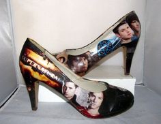 a pair of high heeled shoes with pictures of actors on the upper part of them