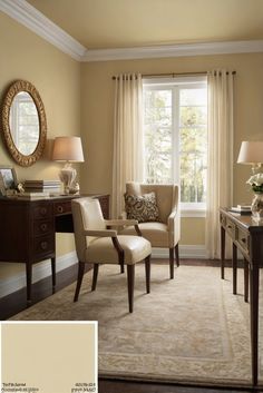 a living room with two chairs and a desk in front of a large window that has curtains on the windowsill