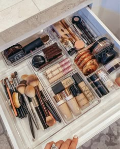 the drawer is full of makeup and cosmetics