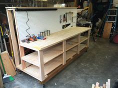 a workbench in a garage with tools on it