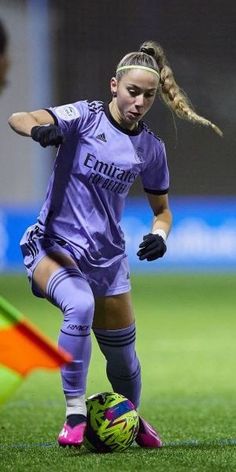 a female soccer player in action on the field