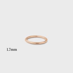 A classic band that goes perfectly with any engagement ring and is a great addition to any stack! 14k Rose Gold Stackable Rings, Classic Everyday Halo Rings, Stackable Promise Rings With Smooth Bezel, Delicate Rose Gold Stackable Rings With Round Band, Rose Gold Stackable Rings With Halo, Rose Gold Halo Stackable Rings, Classic 14k Rose Gold Stackable Rings For Promise, Classic Stackable Rings For Round Band, Classic 14k Rose Gold Stackable Promise Rings