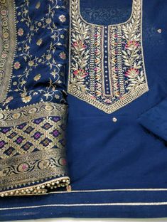 Item Overview ATHARVA Hand Embroidery Salwar Kameez/Navy Blue Chanderi Silk/Banarsi Silk Meenakari Dupatta/Custom Stitch Unstitch/Patiala/Anarkali/Gift Dno. CH1689 Fabric: * Shirt - Chanderi Silk- Hand Embroidered Neck - Red- 2.5 Mts - Beautiful Hand Embroidery * Dupatta: Banarsi Dola Silk Meenakari Dupatta- 2.5 Mts- Latkans Tassels * Bottom Santoon Silk 2.5 Mts. Heavy Quality/ Stitched without lining Excusive Hand Embroidered Party Wear Punjabi Suit. Customization: * Fabrics Customization: Desi Patiala Salwar Kameez, Embroidery Dupatta, Embroidered Pants, Patiala Salwar, Punjabi Suit, Punjabi Suits, Different Fabrics, Anarkali, Beautiful Hand