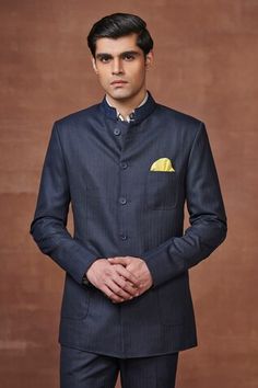 Navy full sleeve bandhgala with textured pattern. Paired with a straight pant. - Aza Fashions Designer Long Sleeve Bandhgala For Formal Occasions, Designer Long Sleeve Bandhgala For Formal Events, Designer Nehru Jacket With Long Sleeves For Diwali, Designer Long Sleeve Nehru Jacket For Diwali, Designer Bandhgala For Semi-formal Occasions, Designer Tailored Long Sleeve Kurta, Designer Long Sleeve Tailored Kurta, Traditional Tailored Bandhgala For Reception, Fitted Bandhgala With Stand Collar For Diwali