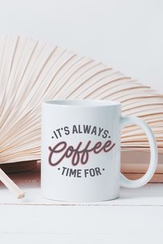 it's always coffee time for mug next to an open book