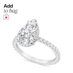 a pear shaped diamond ring with diamonds on the band and an ad for to bag