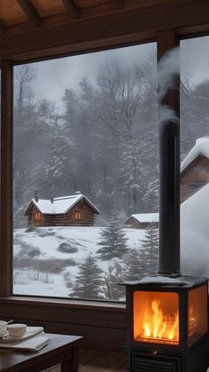 a room with a large window and a fire place in the corner that has snow on it